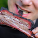 man eating bbq